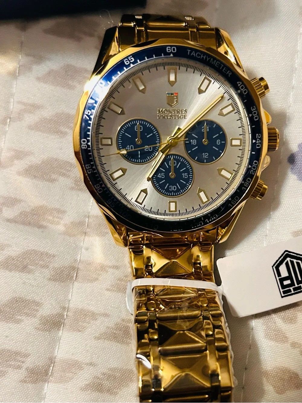 Gold Men's Chronograph Watch with Blue Accents